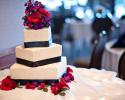 This square wedding cake with flowers is a lovely addition to traditional wedding receptions.